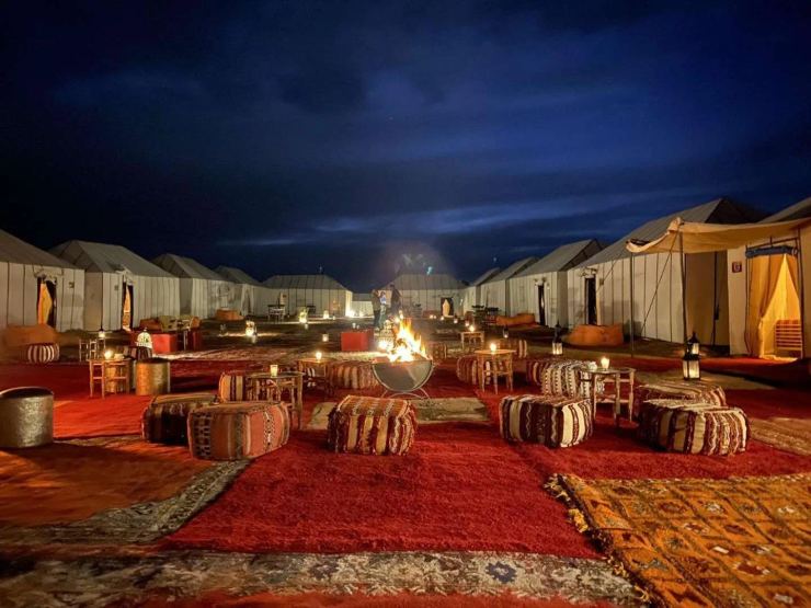 User-provided Google Business photo collection; selected for these drafts at owner request A desert camp at night — illustrative accommodation scene